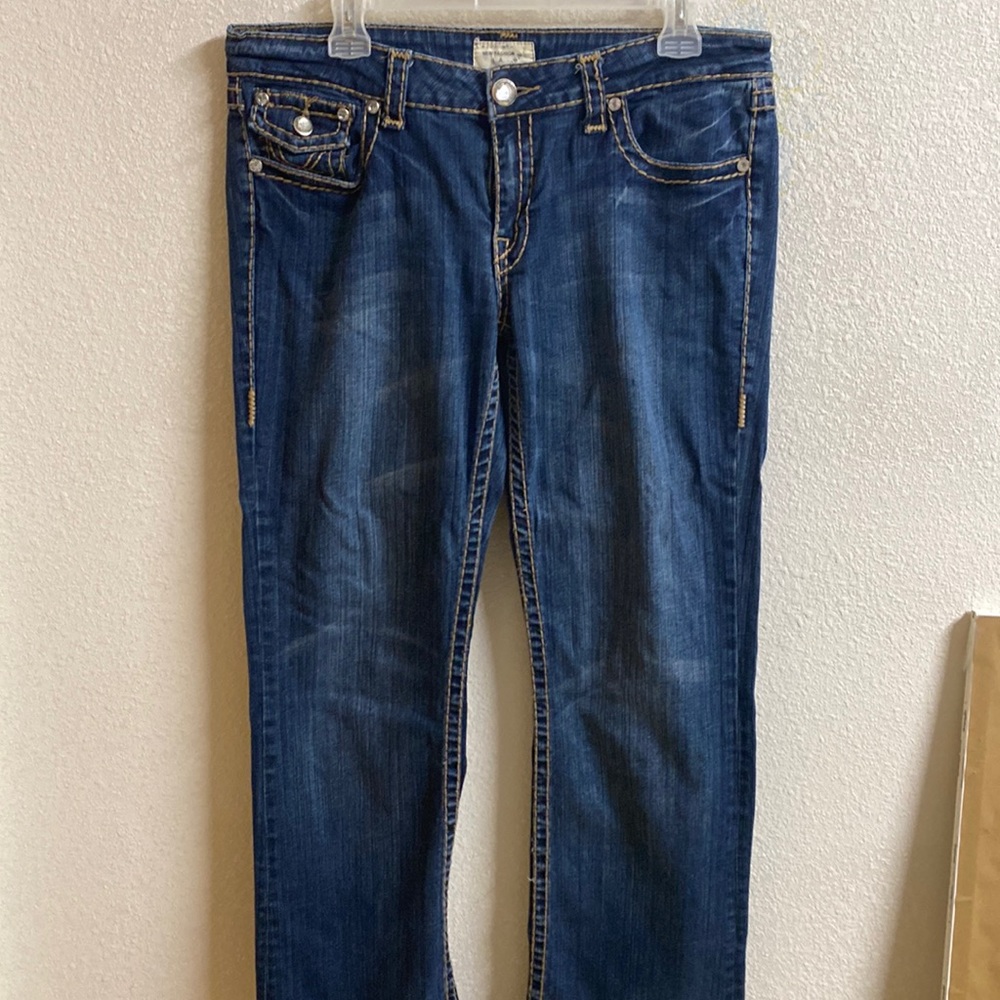 Rhinestone blue jeans.